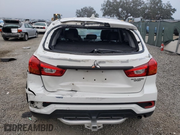2018 Mitsubishi Outlander SE with VIN JA4AP3AWXJU024704, listed as a Copart auction lot 86322864 with 135,602 mi miles and Salvage title. Bid and sale history available at DreamBid. Image 6.