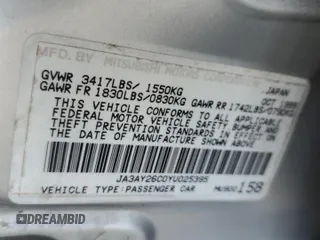 2000 Mitsubishi Mirage DE z VIN JA3AY26C0YU025395, wystawiony jako Copart lot #58173025 z przebiegiem 129 545 mil mil oraz Szkoda całkowita • Salvage title. Historia ofert i sprzedaży dostępna na DreamBid. Obrazek 13.