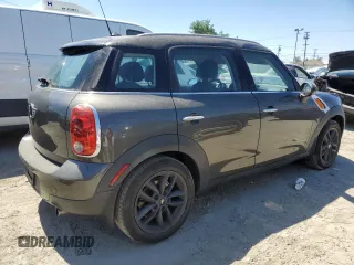 2014 MINI Countryman with VIN WMWZB3C54EWR39731, listed as a Copart auction lot 63635215 with 85,751 mi miles and Salvage title. Bid and sale history available at DreamBid. Image 3.