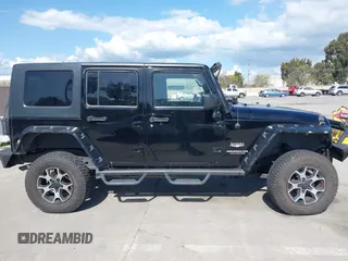 2008 Jeep Wrangler Unlimited Sahara with VIN 1J8GA59168L587554, listed as a IAAI auction lot 41963587 with 189,943 mi miles and . Bid and sale history available at DreamBid. Image 13.
