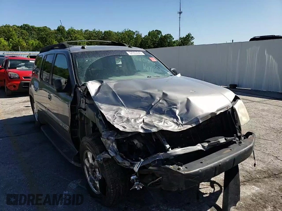 2005 GMC Envoy SLT z VIN 1GKET16M356134877, wystawiony jako Copart lot #57333345 z przebiegiem 205 714 mil mil oraz Szkoda całkowita • Salvage title. Historia ofert i sprzedaży dostępna na DreamBid. Obrazek 13.