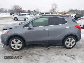 2015 Buick Encore Convenience with VIN KL4CJFSBXFB033767, listed as a IAAI auction lot 41447019 with 131,954 mi miles and . Bid and sale history available at carsss.com. Image 15.