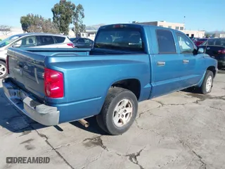 2005 Dodge Dakota SLT with VIN 1D7HE48K85S218934, listed as a IAAI auction lot 41514011 with 122,063 mi miles. Bid and sale history available at carsss.com. Image 4.