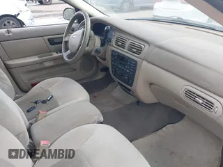 2006 Ford Taurus SE with VIN 1FAFP53U56A209213, listed as a IAAI auction lot 42009423 with 118,083 mi miles. Bid and sale history available at carsss.com. Image 5.