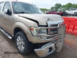 2014 Ford F-150 XL with VIN 1FTFW1CF5EKD00420, listed as a IAAI auction lot 41853974 with 160,472 mi miles and . Bid and sale history available at carsss.com. Image 1.