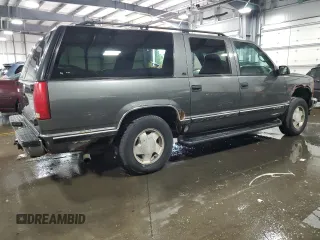 1999 Chevrolet Suburban with VIN 3GNFK16R8XG149091, listed as a Copart auction lot 71300024 with 254,044 mi miles and Salvage Title. Bid and sale history available at carsss.com. Image 3.