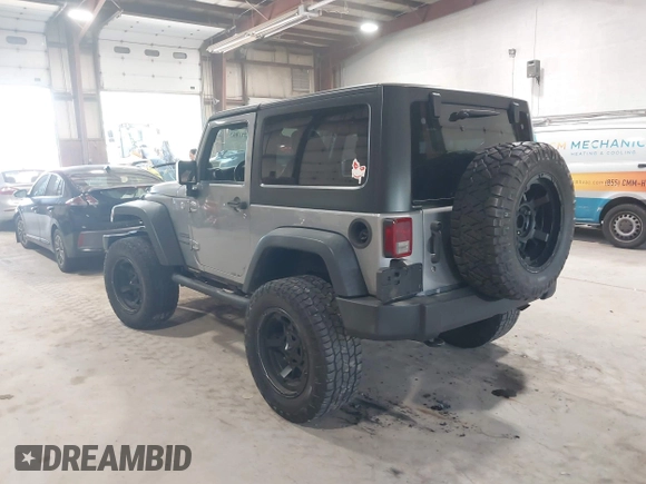 2014 Jeep Wrangler Sport with VIN 1C4AJWAG0EL173362, listed as a IAAI auction lot 42231863 with 99,321 mi miles and . Bid and sale history available at DreamBid. Image 3.