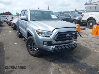 2023 Toyota Tacoma SR with VIN 3TYCZ5AN2PT176554, listed as a IAAI auction lot 42148651 with 15,255 mi miles and . Bid and sale history available at DreamBid. Image 1.