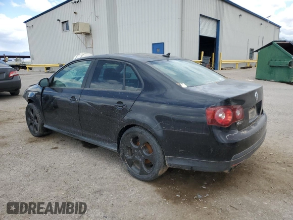 2009 Volkswagen Jetta GLI z VIN 3VWDJ71K79M042969, wystawiony jako Copart lot #50803665 z przebiegiem 191 689 mil mil oraz Szkoda całkowita • Salvage title. Historia ofert i sprzedaży dostępna na DreamBid. Obrazek 2.