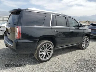 2015 GMC Yukon Denali z VIN 1GKS2CKJ9FR609462, wystawiony jako Copart lot #56685575 z przebiegiem 125 679 mil mil oraz Szkoda całkowita • Salvage title. Historia ofert i sprzedaży dostępna na DreamBid. Obrazek 3.