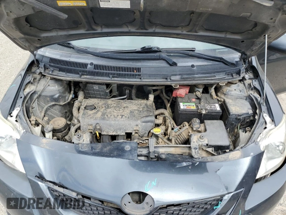 2012 Toyota Yaris with VIN JTDBT4K38CL036729, listed as a Copart auction lot 53514995 with 232,180 mi miles and Salvage Title. Bid and sale history available at DreamBid. Image 11.