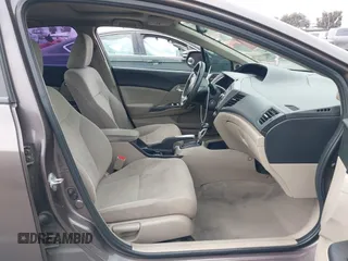 2012 Honda Civic EX with VIN 2HGFB2F89CH517330, listed as a IAAI auction lot 42116208 with 196,861 mi miles and . Bid and sale history available at DreamBid. Image 5.