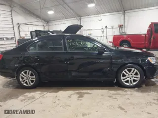 2015 Volkswagen Jetta Sedan 2.0L S w/Technology with VIN 3VW2K7AJ6FM351274, listed as a IAAI auction lot 41616855 with 116,615 mi miles. Bid and sale history available at carsss.com. Image 13.