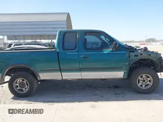 1997 Ford F-150 XL with VIN 1FTEX18L0VKC14651, listed as a IAAI auction lot 41228875 with 251,074 mi miles. Bid and sale history available at carsss.com. Image 14.