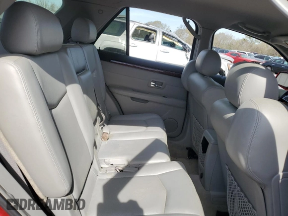 2009 Cadillac SRX RWD z VIN 1GYEE637790145952, wystawiony jako Copart lot #50309815 z przebiegiem 130 858 mil mil oraz Szkoda całkowita • Salvage title. Historia ofert i sprzedaży dostępna na DreamBid. Obrazek 12.