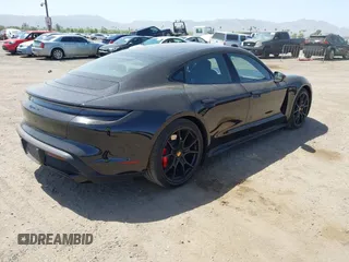 2022 Porsche Taycan GTS z VIN WP0AD2Y12NSA59275, wystawiony jako IAAI lot #42170547 z przebiegiem 43 757 mil mil oraz . Historia ofert i sprzedaży dostępna na DreamBid. Obrazek 4.
