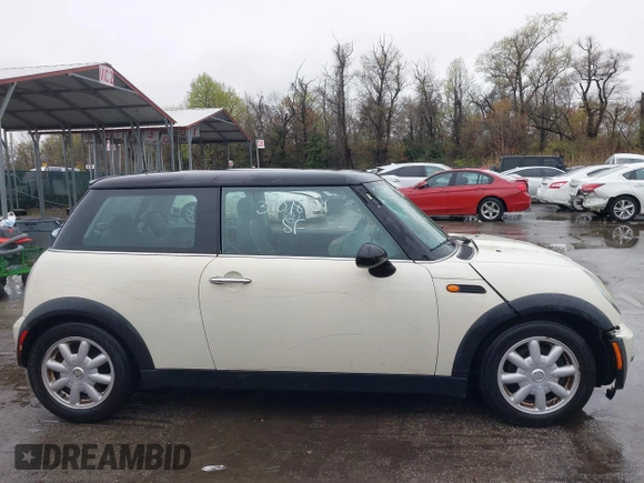 2004 MINI Hardtop with VIN WMWRC33434TJ60941, listed as a IAAI auction lot 39078161 with 143,107 mi miles and . Bid and sale history available at DreamBid. Image 14.