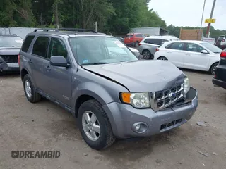 2008 Ford Escape XLT with VIN 1FMCU93108KE75766, listed as a IAAI auction lot 42595254 with 165,436 mi miles and . Bid and sale history available at DreamBid. Image 1.