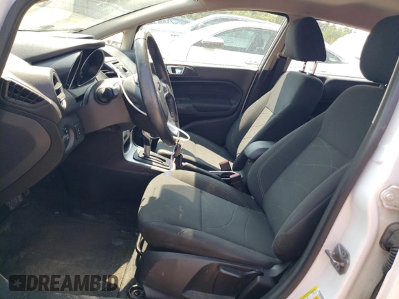 2015 Ford Fiesta SE z VIN 3FADP4EJ7FM169000, wystawiony jako Copart lot #64402674 z przebiegiem 191 221 mil mil oraz Szkoda całkowita • Salvage title. Historia ofert i sprzedaży dostępna na DreamBid. Obrazek 7.