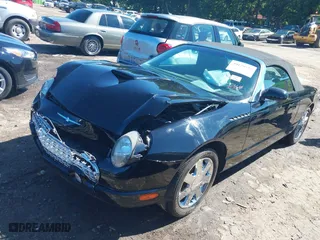 2002 Ford Thunderbird w/Hardtop Premium with VIN 1FAHP60AX2Y116200, listed as a IAAI auction lot 40129557 with 88,991 mi miles. Bid and sale history available at carsss.com. Image 18.