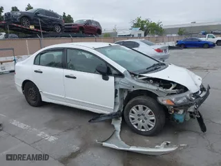 2009 Honda Civic Sdn DX-VP with VIN 2HGFA16329H343384, listed as a IAAI auction lot 42035984 with 117,647 mi miles. Bid and sale history available at carsss.com. Image 1.