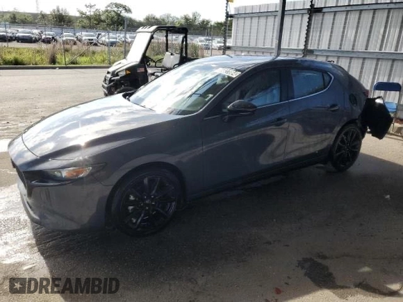 2024 Mazda 3 S Carbon Edition with VIN JM1BPBLM3R1709768, listed as a Copart auction lot 57072455 with 3,815 mi miles and Clean title. Bid and sale history available at DreamBid. Image 2.