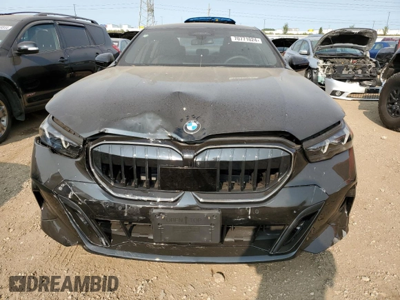 2024 BMW 5 Series 540i xDrive with VIN WBA63FJ06RCR52447, listed as a Copart auction lot 70771024 with 0 mi miles and Salvage Title. Bid and sale history available at carsss.com. Image 5.