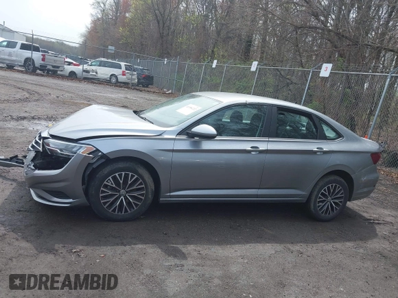 2021 Volkswagen Jetta S z VIN 3VWC57BUXMM048600, wystawiony jako IAAI lot #41956222 z przebiegiem 59 870 mil mil oraz . Historia ofert i sprzedaży dostępna na DreamBid. Obrazek 14.