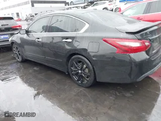 2018 Nissan Altima 2.5 SL with VIN 1N4AL3AP4JC288183, listed as a IAAI auction lot 41466582 with 100,858 mi miles. Bid and sale history available at carsss.com. Image 3.