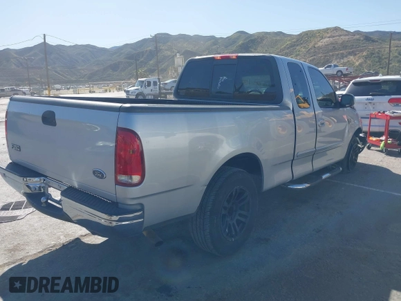 1999 Ford F-150 XL with VIN 1FTRX17L3XKB76368, listed as a IAAI auction lot 41959746 with Not Provided miles. Bid and sale history available at carsss.com. Image 4.