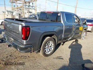 2021 GMC Sierra 1500 with VIN 3GTP8DET1MG382882, listed as a IAAI auction lot 41615193 with 64,120 mi miles and . Bid and sale history available at DreamBid. Image 4.