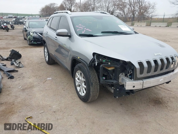 2014 Jeep Cherokee Latitude with VIN 1C4PJMCS7EW220899, listed as a IAAI auction lot 41973561 with 135,572 mi miles. Bid and sale history available at carsss.com. Image 1.