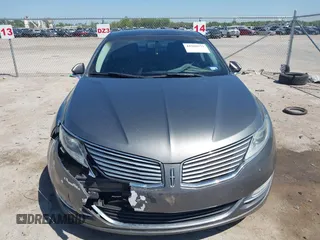 2014 Lincoln MKZ z VIN 3LN6L2G92ER835456, wystawiony jako IAAI lot #41985573 z przebiegiem 174 080 mil mil oraz . Historia ofert i sprzedaży dostępna na DreamBid. Obrazek 12.
