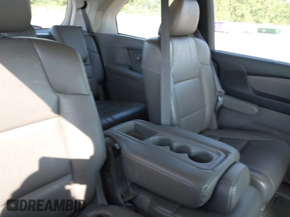 2011 Honda Odyssey EX-L with VIN 5FNRL5H66BB058333, listed as a IAAI auction lot 42172045 with 215,723 mi miles and . Bid and sale history available at carsss.com. Image 8.