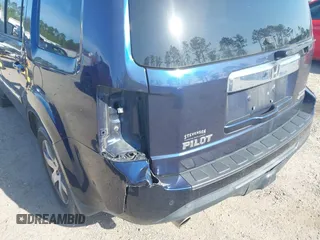 2014 Honda Pilot Touring with VIN 5FNYF4H92EB019248, listed as a IAAI auction lot 41942963 with 136,183 mi miles and . Bid and sale history available at carsss.com. Image 6.