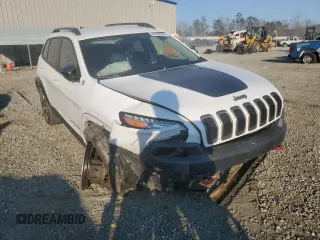 2015 Jeep Cherokee Trailhawk z VIN 1C4PJMBSXFW642149, wystawiony jako Copart lot #46656565 z przebiegiem 100 496 mil mil oraz Szkoda całkowita • Salvage title. Historia ofert i sprzedaży dostępna na DreamBid. Obrazek 4.