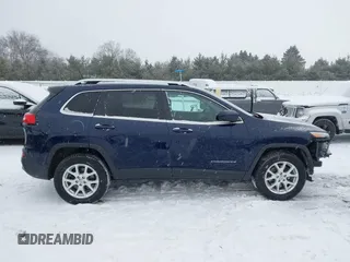 2014 Jeep Cherokee Altitude with VIN 1C4PJMCB9EW187288, listed as a IAAI auction lot 41320161 with 169,534 mi miles and . Bid and sale history available at DreamBid. Image 14.