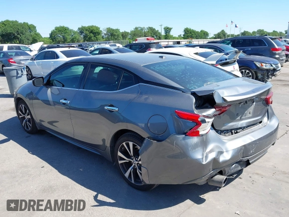 2016 Nissan Maxima SR with VIN 1N4AA6AP9GC414943, listed as a IAAI auction lot 41976295 with 154,738 mi miles and . Bid and sale history available at DreamBid. Image 3.