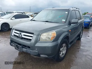 2008 Honda Pilot EX-L with VIN 5FNYF28548B007852, listed as a IAAI auction lot 42387060 with 261,023 mi miles and . Bid and sale history available at DreamBid. Image 2.