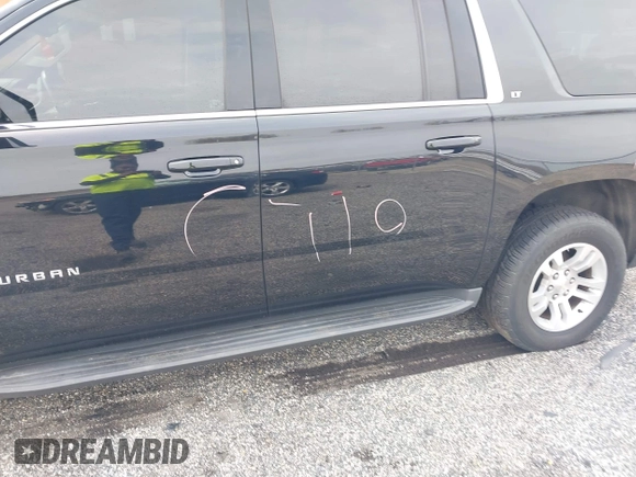 2019 Chevrolet Suburban LT with VIN 1GNSKHKC4KR405843, listed as a IAAI auction lot 41944385 with 123,071 mi miles and . Bid and sale history available at DreamBid. Image 6.
