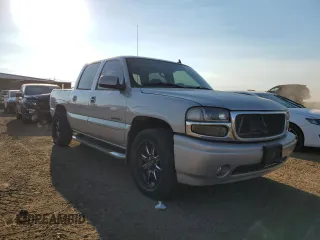 2006 GMC Sierra Denali z VIN 2GTEK63N561121615, wystawiony jako Copart lot #73488154 z przebiegiem 197 788 mil mil oraz Szkody całkowita. Historia ofert i sprzedaży dostępna na DreamBid. Obrazek 4.