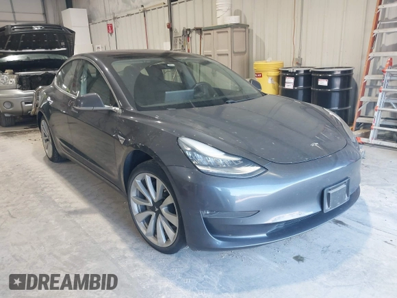 2018 Tesla Model 3 Long Range Battery with VIN 5YJ3E1EB1JF145520, listed as a IAAI auction lot 41360939 with 95,010 mi miles and . Bid and sale history available at DreamBid. Image 1.