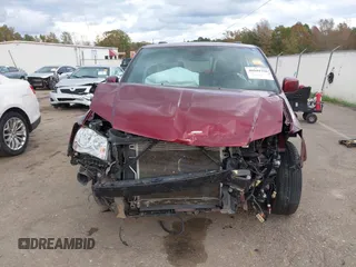 2019 Dodge Grand Caravan SXT with VIN 2C4RDGCGXKR585563, listed as a IAAI auction lot 40949350 with 122,577 mi miles and . Bid and sale history available at DreamBid. Image 13.