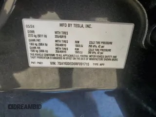 2024 Tesla Model Y with VIN 7SAYGDED6RF091715, listed as a Copart auction lot 56535585 with 23,120 mi miles and Salvage title. Bid and sale history available at DreamBid. Image 13.