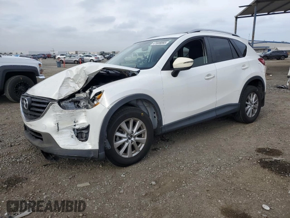 2016 Mazda CX-5 Touring with VIN JM3KE2CY5G0838663, listed as a Copart auction lot 47658065 with 51,470 mi miles and Salvage Title. Bid and sale history available at carsss.com. Image 1.