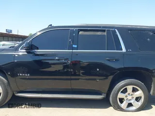 2016 Chevrolet Tahoe LS with VIN 1GNSCAKCXGR482874, listed as a IAAI auction lot 42016639 with 110,744 mi miles and . Bid and sale history available at DreamBid. Image 14.