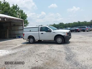 2018 Ford F-150 XL with VIN 1FTMF1CB3JKE51738, listed as a IAAI auction lot 42387561 with 110,951 mi miles and . Bid and sale history available at DreamBid. Image 14.