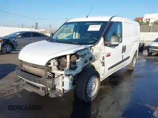 2022 Ram ProMaster City Passenger with VIN ZFBHRFAB3N6W22014, listed as a IAAI auction lot 41210237 with 77,209 mi miles. Bid and sale history available at carsss.com. Image 6.