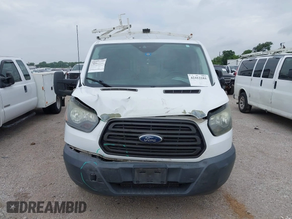2016 Ford Transit Cargo with VIN 1FTYE1ZM6GKA95971, listed as a IAAI auction lot 42412181 with 243,171 mi miles and . Bid and sale history available at DreamBid. Image 12.