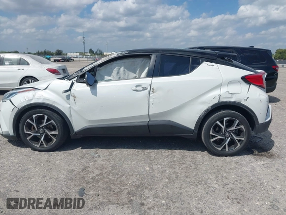 2020 Toyota C-HR LE z VIN NMTKHMBX7LR109784, wystawiony jako IAAI lot #41800460 z przebiegiem 30 514 mil mil oraz . Historia ofert i sprzedaży dostępna na DreamBid. Obrazek 14.